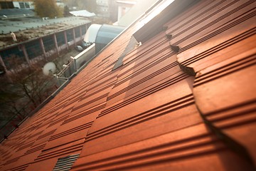 Image showing Roof tile over blue sky