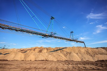 Image showing Large excavator machine in the mine