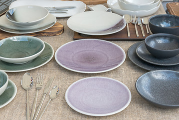 Image showing ceramic plates and cups of different colors
