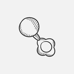 Image showing Baby rattle sketch icon.