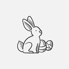 Image showing Easter bunny with eggs sketch icon.