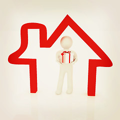 Image showing Presentation of new house. 3d man holds the gift, and is within 