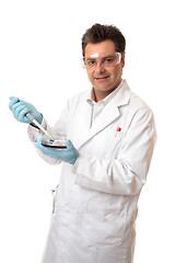 Image showing Scientist or biologist using  pipette