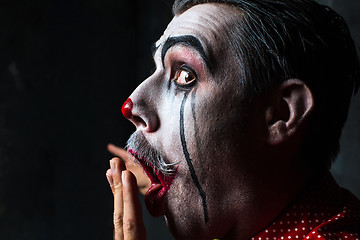 Image showing Terrible crazy clown and Halloween theme