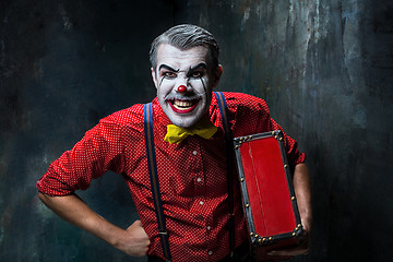 Image showing Terrible crazy clown and Halloween theme