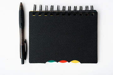 Image showing notepad with pen isolated