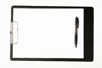 Image showing Black clipboard with a pen isolated