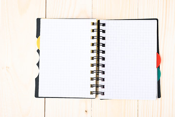 Image showing notepad with pen isolated