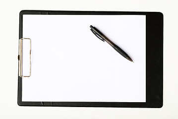 Image showing Black clipboard with a pen isolated