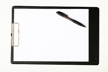 Image showing Black clipboard with a pen isolated