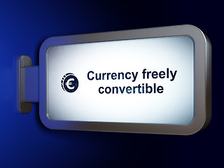 Image showing Banking concept: Currency freely Convertible and Euro Coin on billboard background