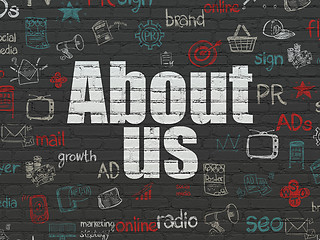 Image showing Marketing concept: About Us on wall background