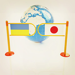 Image showing Three-dimensional image of the turnstile and flags of Japan and 