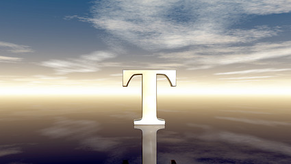 Image showing metal uppercase letter t under cloudy sky - 3d rendering