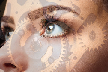 Image showing Photo of woman eye and clockwork. Double exposure