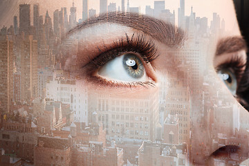 Image showing Photo of woman eye and business city. Double exposure