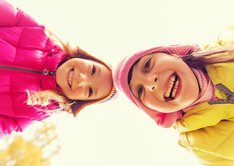 Image showing happy girls faces outdoors