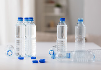 Image showing close up of bottles with drinking water on table