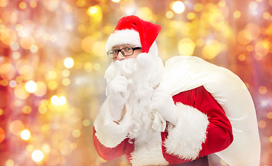 Image showing man in costume of santa claus with bag