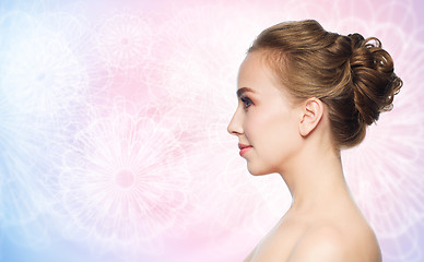 Image showing beautiful young woman face over white background