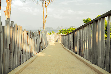 Image showing road with fence at seaside