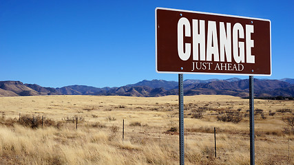 Image showing Change Just Ahead brown road sign