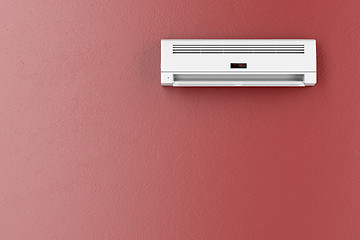 Image showing Air conditioner on red wall 