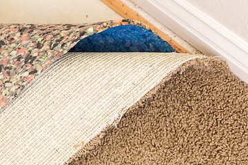 Image showing Pulled Back Carpet and Padding In Room