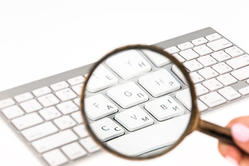 Image showing Laptop with a magnifying glass