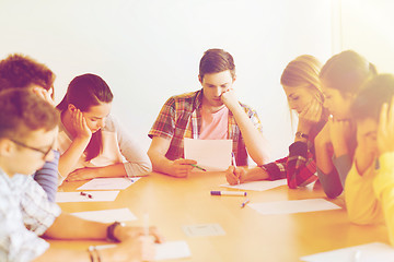 Image showing group of students with papers