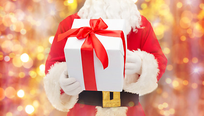 Image showing man in costume of santa claus with gift box