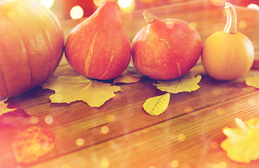 Image showing close up of pumpkins on wooden table at home