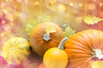 Image showing close up of pumpkins on wooden table at home