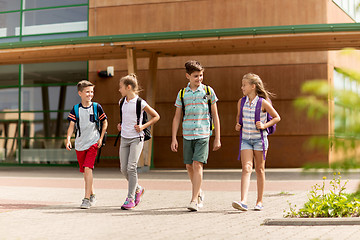 Image showing group of happy elementary school students walking