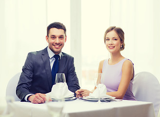 Image showing smiling couple at restaurant