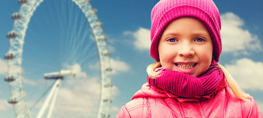 Image showing happy little girl portrait over ferry wheel