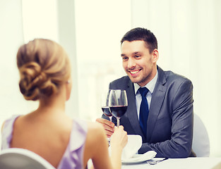 Image showing young man looking at girlfriend or wife