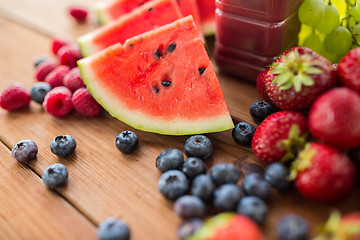 Image showing bottle with fruit and berry juice or smoothie