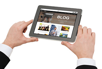 Image showing close up of man blogging on tablet pc