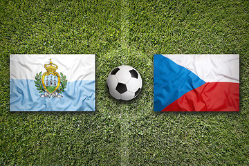 Image showing San Marino vs. Czech Republic flags on soccer field