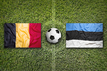 Image showing Belgium vs. Estonia flags on soccer field