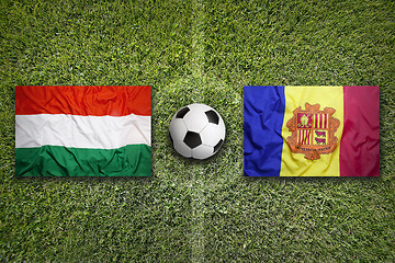 Image showing Hungary vs. Andorra flags on soccer field