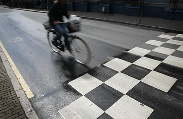 Image showing Fast morning cyclist