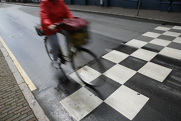 Image showing Fast morning cyclist