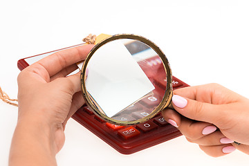 Image showing Concept for Internet shopping: hands with Magnifier and price tag