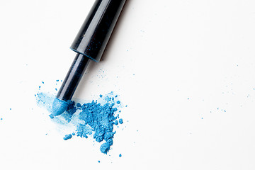 Image showing Scattered blue shadows with applicator on pure background