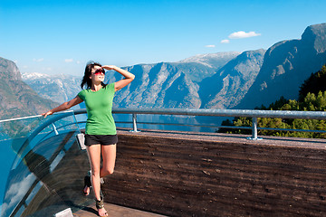 Image showing Woman enjoying scenics from Stegastein Viewpoint