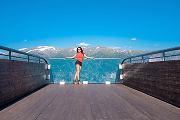 Image showing Woman enjoying scenics from Stegastein Viewpoint