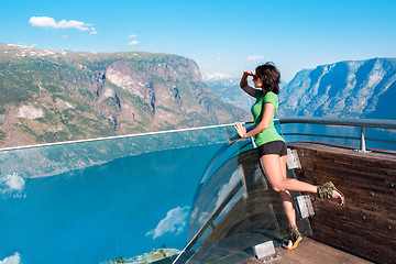 Image showing Woman enjoying scenics from Stegastein Viewpoint