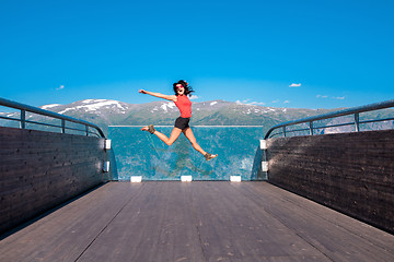 Image showing Excited woman tourist at Stegastein Viewpoint